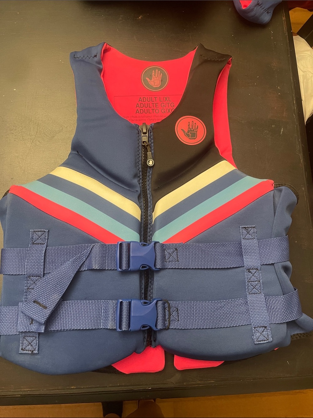 Body Glove Navy Blue Life Jacket with Red and Light Blue Stripes